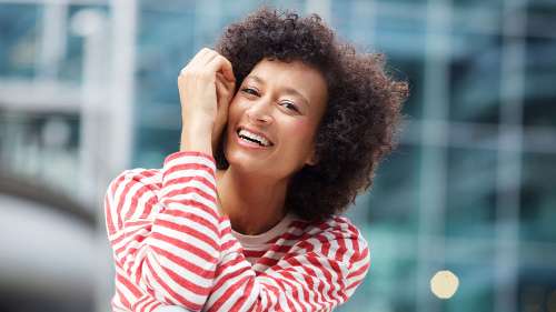 woman with a bright smile at the dentist in brandon fl