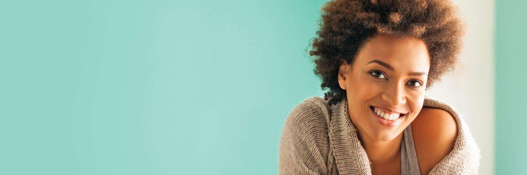 Woman smiling at teeth whitening dentist in Brandon, FL