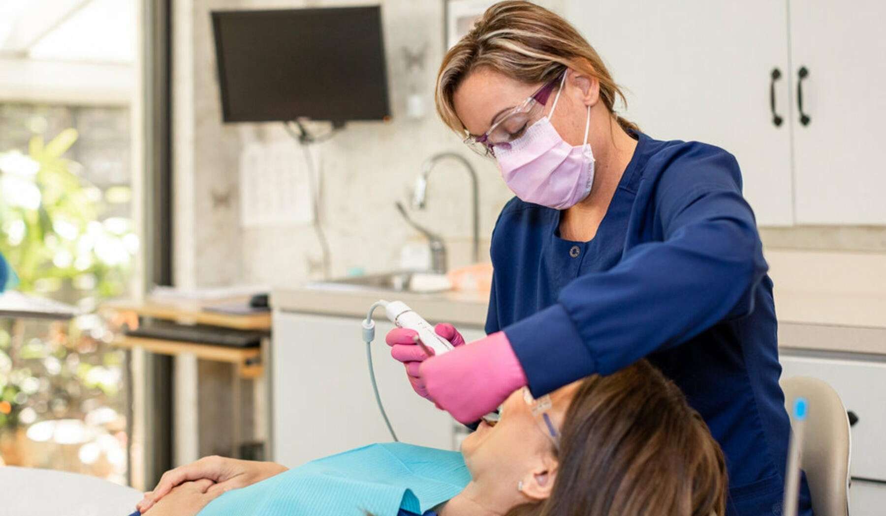 Patient getting teeth whitening treatment in Brandon, FL