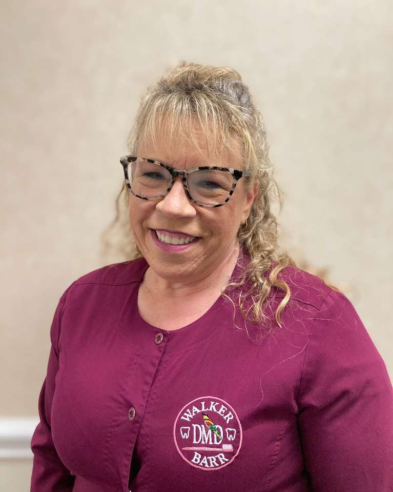 Kimmy, a dental hygienist at Walker & Barr DMD